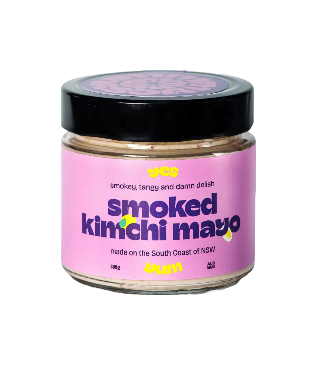 Jar of smoked kimchi mayo with pink label on a white background